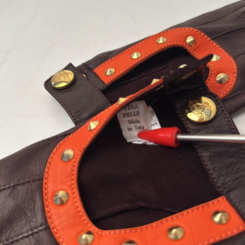 VIVIENNE WESTWOOD
BRAND NEW VINTAGE GLOVES ORANGE/BROWN/SILVER LEATHER WSTUDS M - Picture 11 of 17